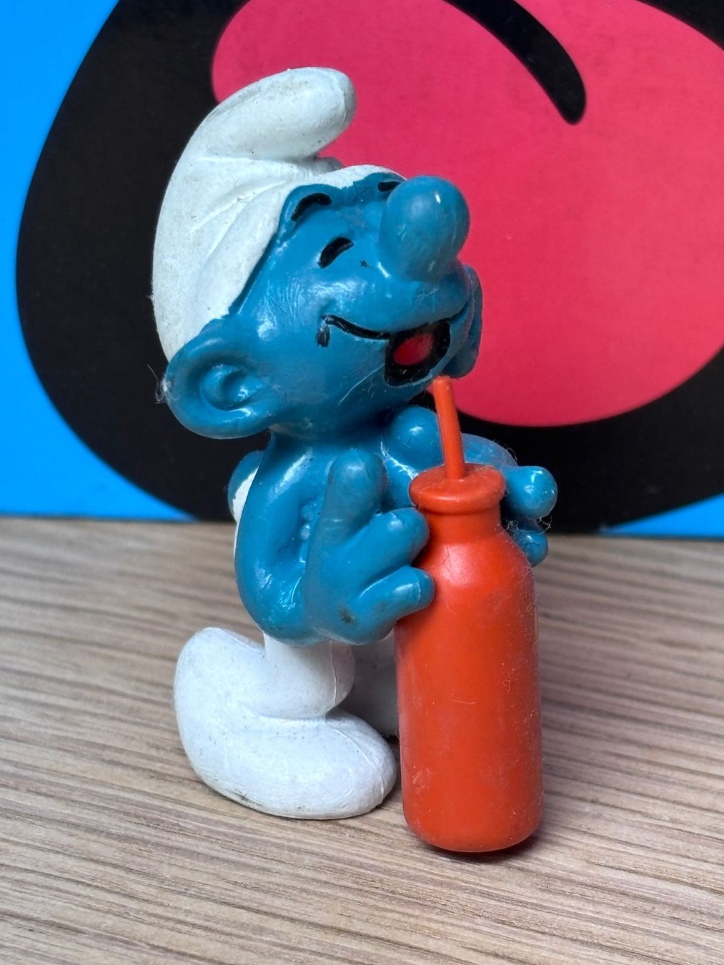 Schleich Figuren: Schlumpf mit oranger Flasche – Gebraucht aus Lyss von Duckszone