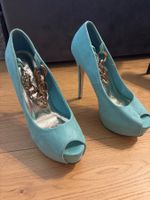 Türkise Plateau High Heels Stiletto mit Kettchen