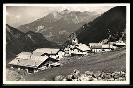 AK Stuls, Ort mit Kirche und Bergpanorama