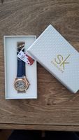 montre à quartz SK pour femme