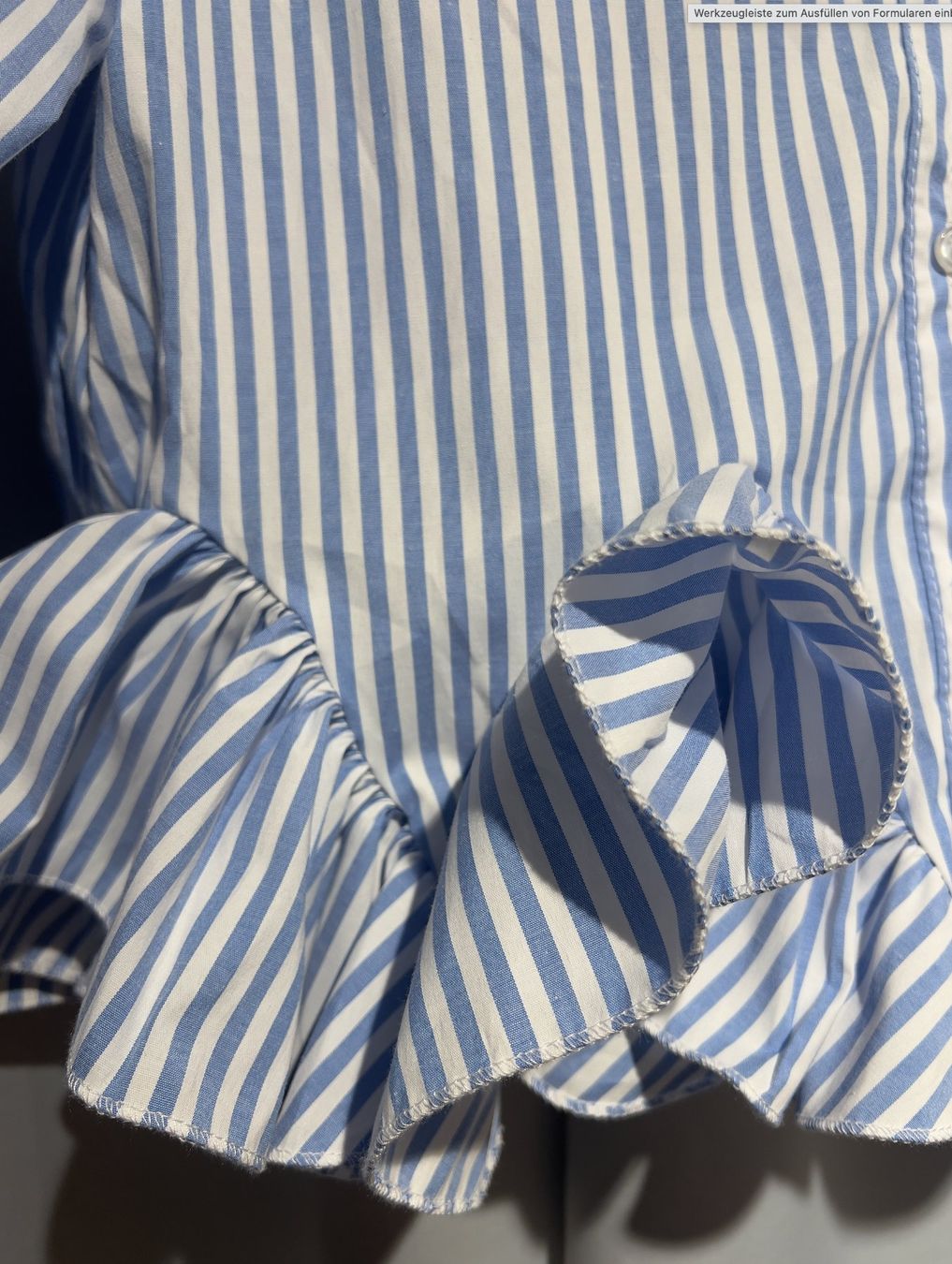 Chemisiers: Gestreifte Bluse mit Volants hellblau/weiss – Neuf avec emballage d'origine à Zürich par Naebeli 1