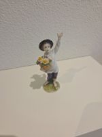 Sitzendorf Porzellanfigur „Blumenjunge“.