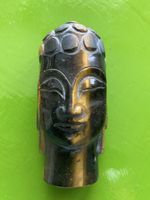 Buddha Kopf aus Tigerauge geschnitzt