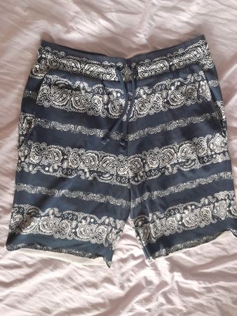 short bleu marine à motif taille M