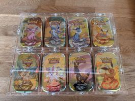 Pokemon Prismatic Evolutions Mini Tins in Acryl Leer