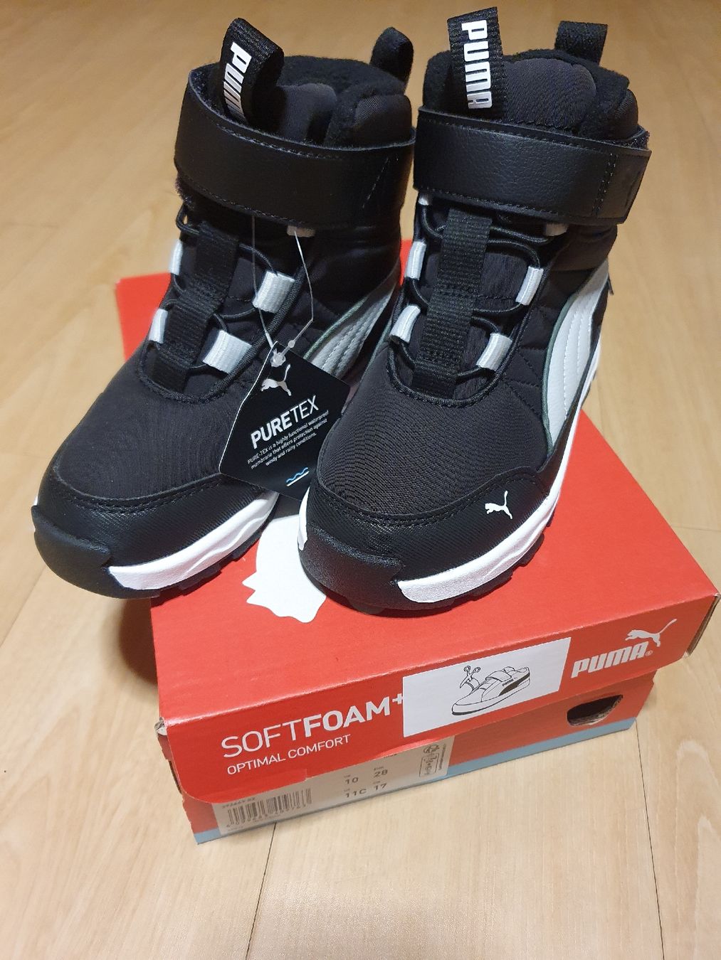 Puma Scarpe per ragazzi: NEU Puma Schuhe Gr. 28 schwarz - PureTex – Nuovo e nell'imballaggio originale da Val D Illiez venduto da SnowRoof