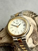 Montre Seiko Quartz bicolore très belle 