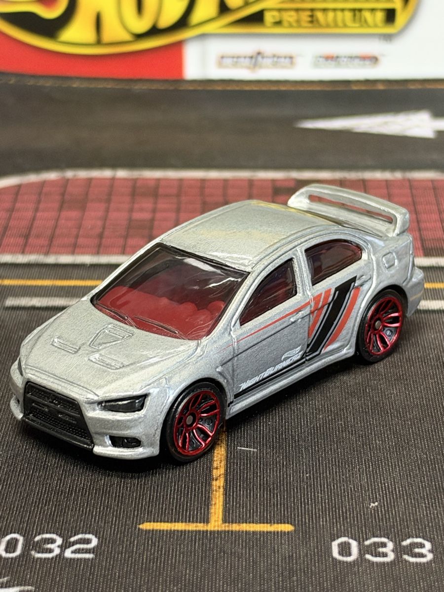 Hot Wheels Modellini d'auto: Hot Wheels Mitsubishi Lancer Evolution 2008 argenté – Usato da rolle venduto da Noma-collectible 1