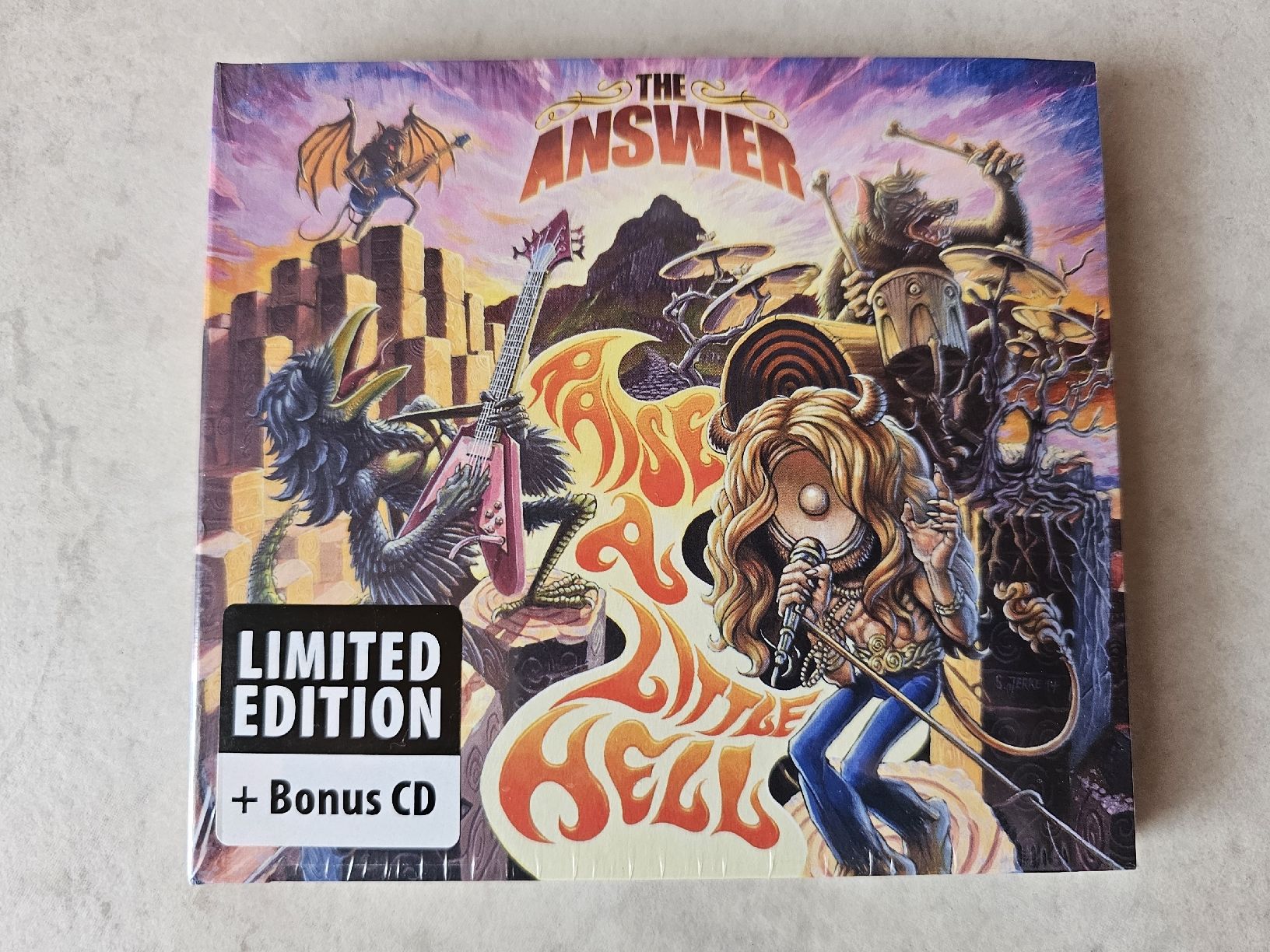 CD: The Answer - Raise A Little Hell / Limited Edition Fabrikneu – Nuovo e nell'imballaggio originale da Schneisingen venduto da backstore24
