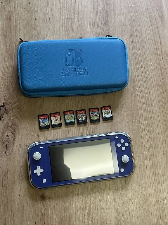 Consoles: Nintendo Switch Lite + 6 Spiele + Tasche – D'occasion à Luzern par Wilson019