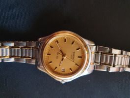 Tissot dame, bracelet acier inoxydable, Déffectieux.