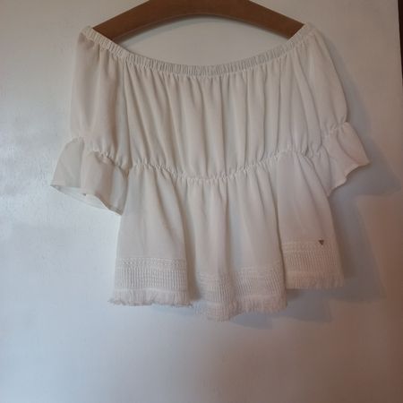GUESS Top blanc taille L avec dentelle.