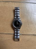 Elegante Swatch Uhr mit Edelstahlarmband