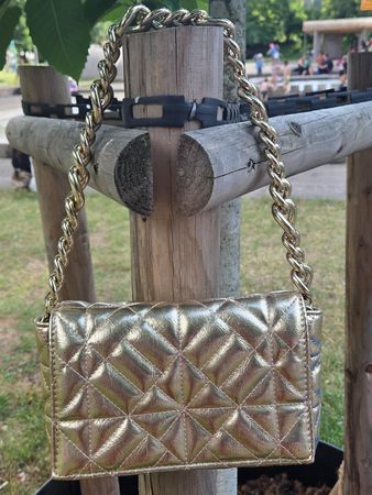 Golden quilted bag