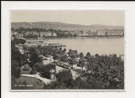 AK ca. 1940 Zürich Quais mit Tram und Schiff