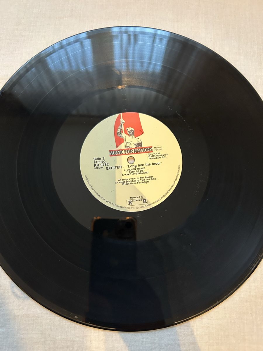 Schallplatten: Exciter / Long Live The Loud  1985 – Gebraucht aus Genève von NipponiaNippon 1