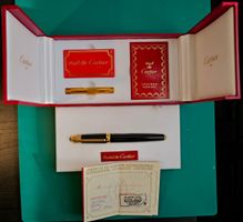 Plume Pasha de Cartier Trinity noir et plaqué or