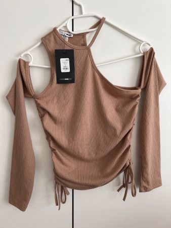 Pull neuf à épaules dénudées taille S
