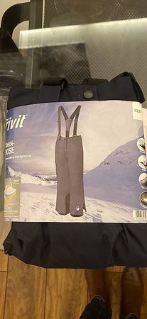 Pantalon de ski taille 122/128 bleu marine  avec bas de ski 