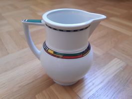 Rahmkrug aus Porzellan