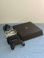 PlaySation 4 Pro SSD 500GB 2 controller et cables