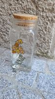 Barattolo in vetro con decoro floreale e tappo in sughero