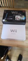 Console Nintendo Wii pack Mario Kart avec 10 jeux