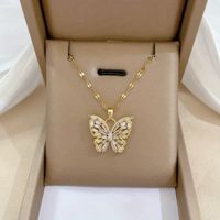 Goldkette mit Anhänger Schmetterling Strass neu