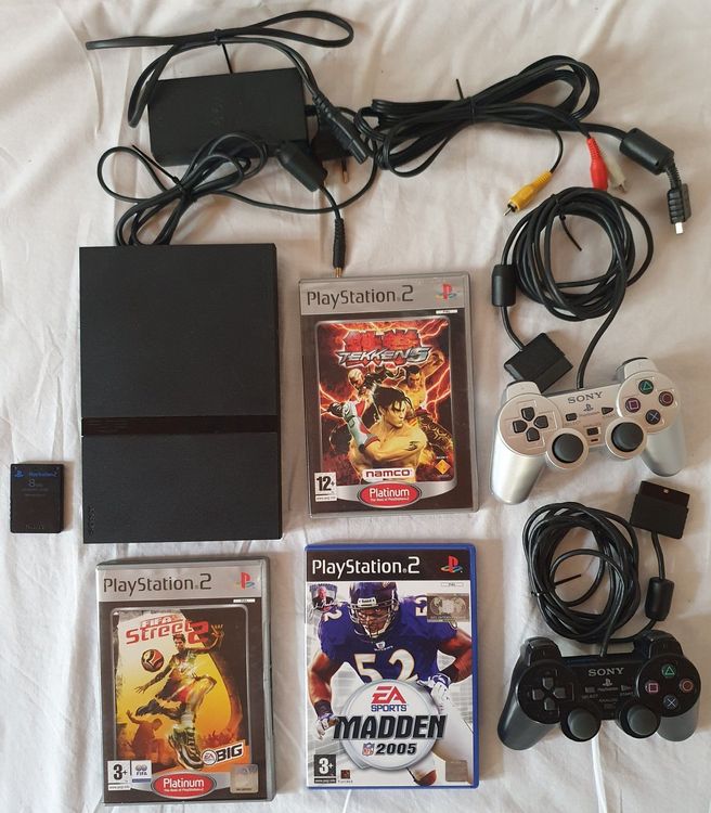 Console ps2 avec 8 jeux 2 manettes (Gebraucht) in für CHF 23 - mit