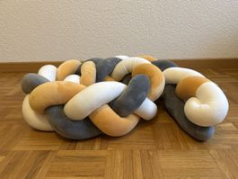 Coussin tressé