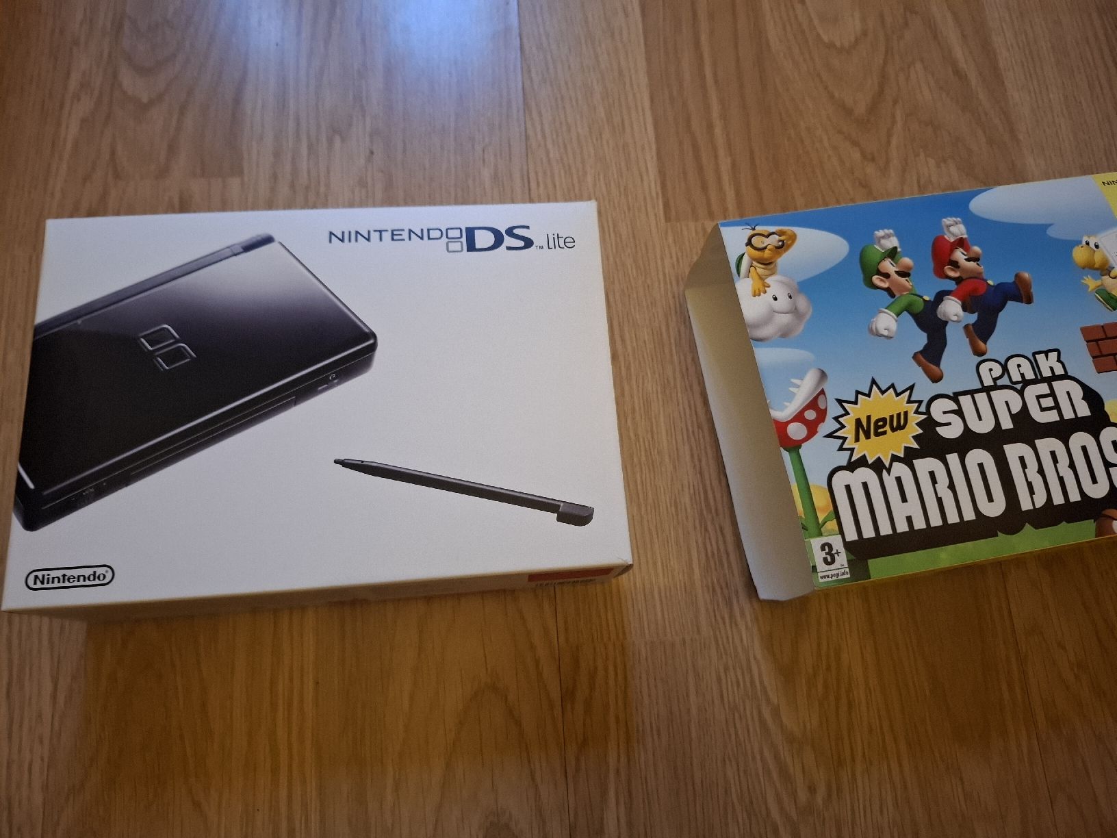 Nintendo Spiele: Nintendo DS lite + New Super Mario Bros – Gebraucht aus Biel/Bienne von st-Pixel 2