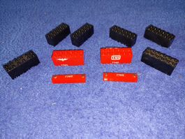 Lego rote und schwarzr Gewichtsteine