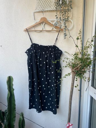 Robe à pois noire bretelles ajustables taille M occasion