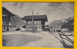 Alte Ansichtskarte, Lenk Bahnhof mit Zug im Schnee