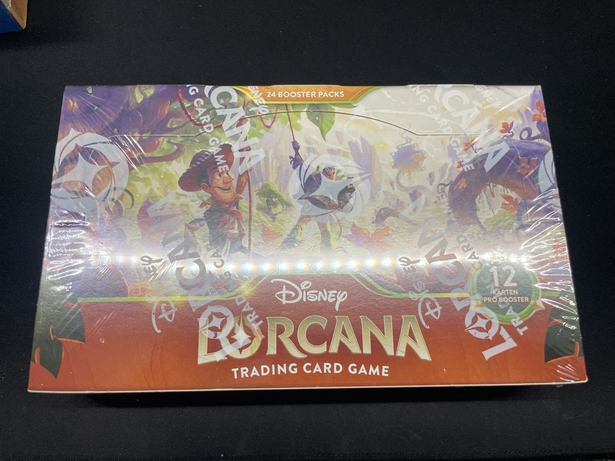Disney Carte collezionabili: Disney Lorcana TCG Booster Display Neu – Nuovo e nell'imballaggio originale da Basel venduto da Medecardo