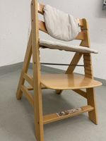 Hauck wooden high chair with cushion, perfect for winter mea