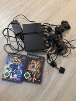 Sony PlayStation 2 Konsole mit Zubehör und zwei Spielen