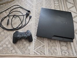 Playstation 3 Konsole mit Controller und Kabeln 