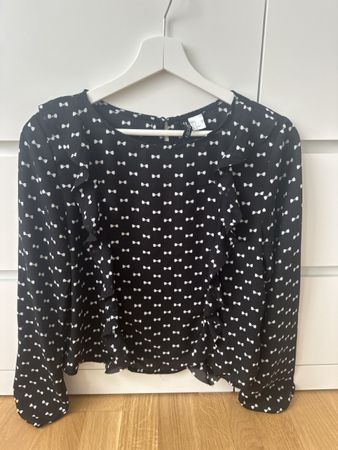 Schwarze Bluse mit weißen Schleifen, Größe 36 - wie neu!