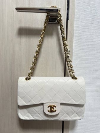 Sac Chanel double flap matelassé en cuir lisse d’agneau 