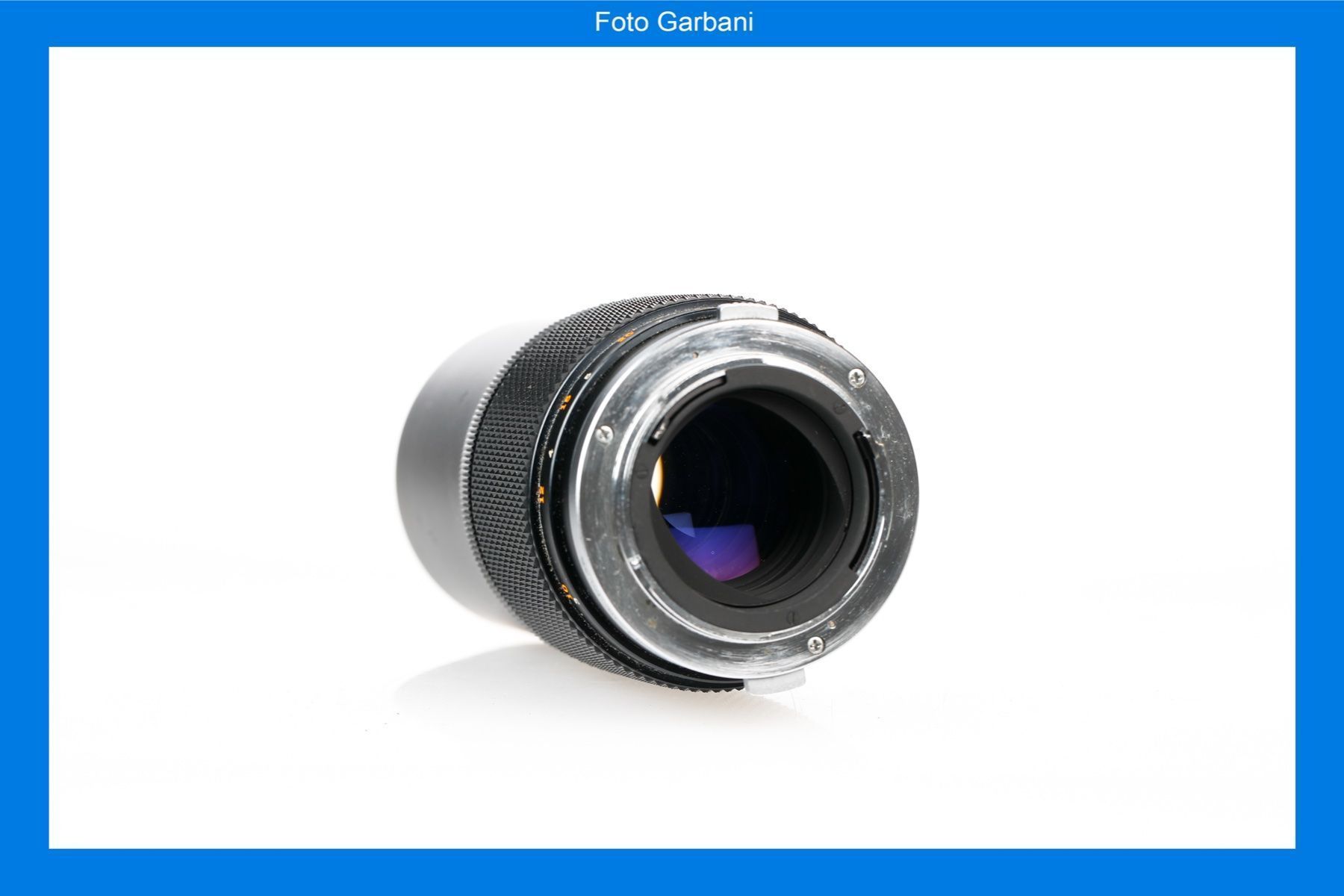 Olympus Obiettivi: Olympus E-Zuiko Auto-T 200mm f4 – Usato da Muralto venduto da FotoGarbani 2