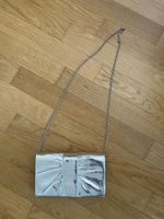 Kleine silberne Globus Tasche