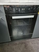 Four Miele H 2451-55 E noir