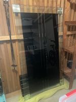 Glastisch mit schwarzen Holzfüssen, gebraucht
