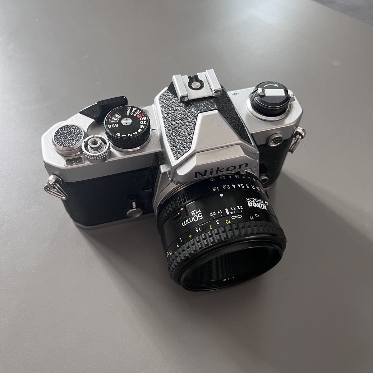 Nikon Fotocamera: Nikon FM + AF nikkor 50mm 1.8 – Usato da Vevey venduto da ramelio 1
