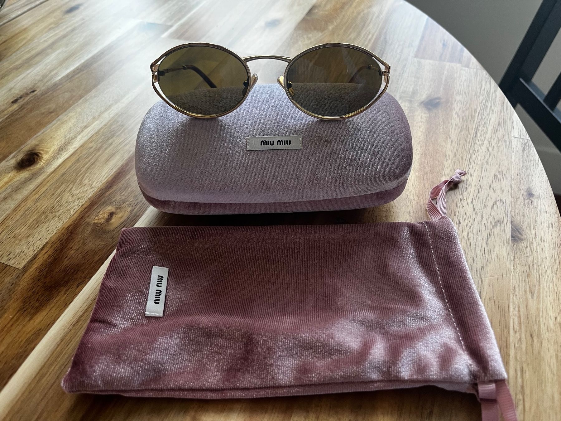 Miu Miu Brillen & Gläser: Miu Miu Sonnenbrille – Neu und originalverpackt aus Brugg AG von bjh6 5