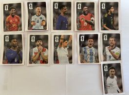 11 der 12 Coca Cola Stickers Panini WM 2026