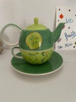 Théière avec tasse intégrée