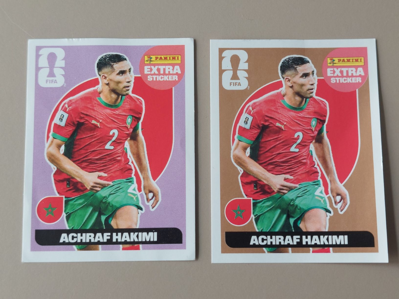 Panini Carte collezionabili: ACHRAF HAKIMI Panini Extra Sticker 2026 Bronze & Violet – Nuovo e nell'imballaggio originale da Zürich venduto da shimibene