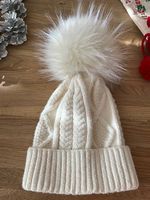 Damenmütze mit Pompon